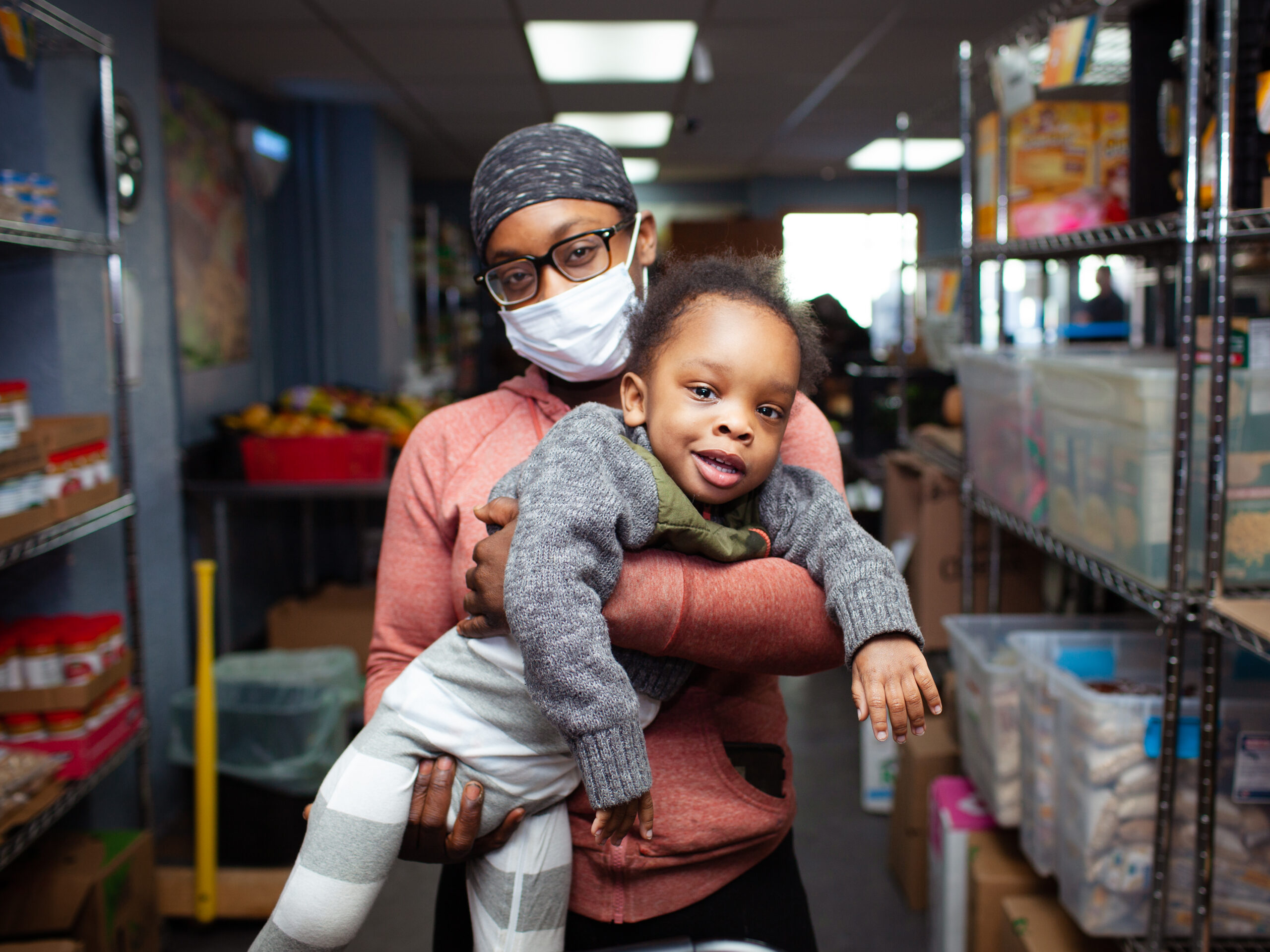 person holding toddler