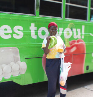 Person excited to have fresh fruits available to them.