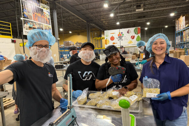 The Food Group team preparing food for distribution.