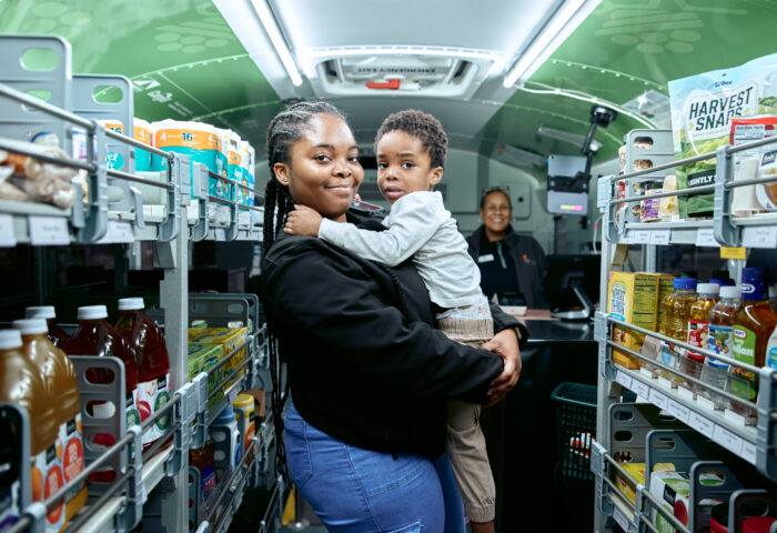 Participant parent and child in the Food Group bus.