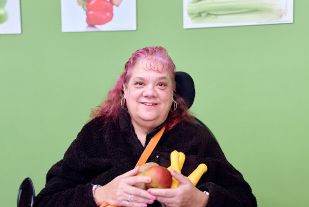 Participant enjoying access to fresh fruits.