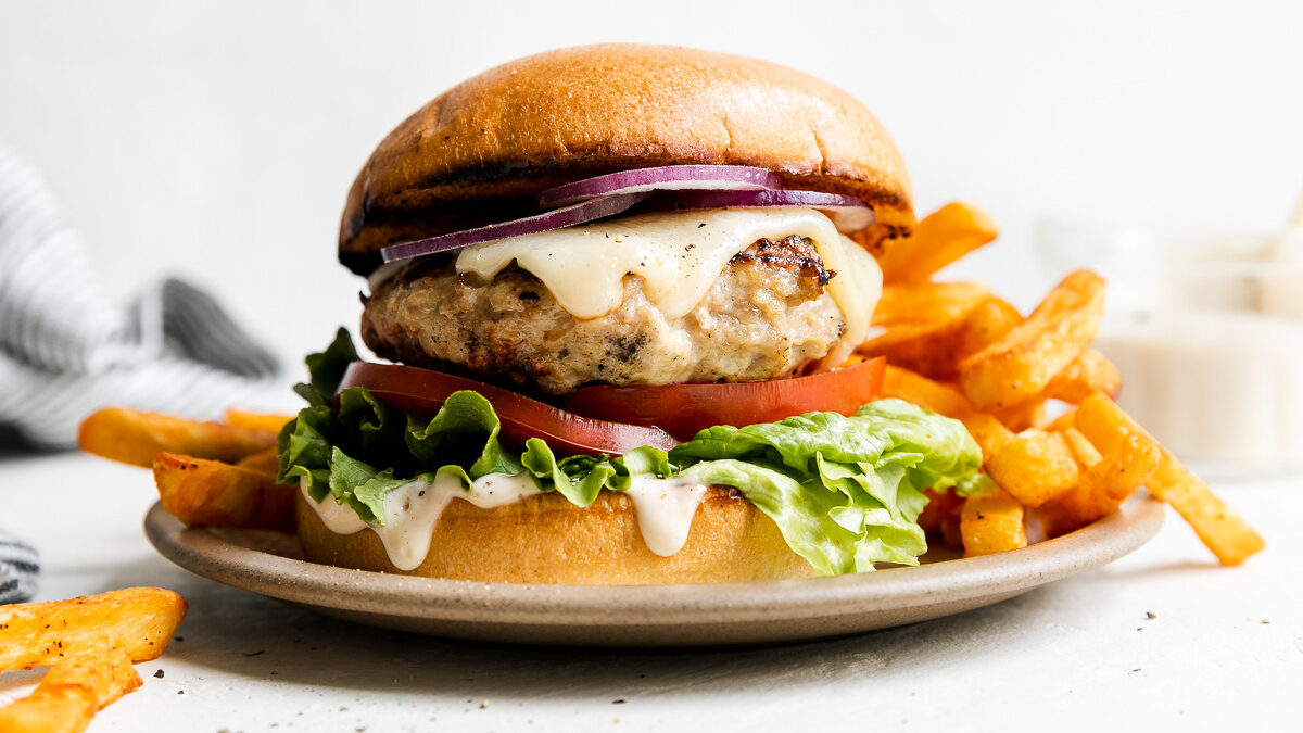 Photo and recipe inspo from Jess Larsen, Plays Well With Butter https://playswellwithbutter.com/grilled-chicken-burgers/