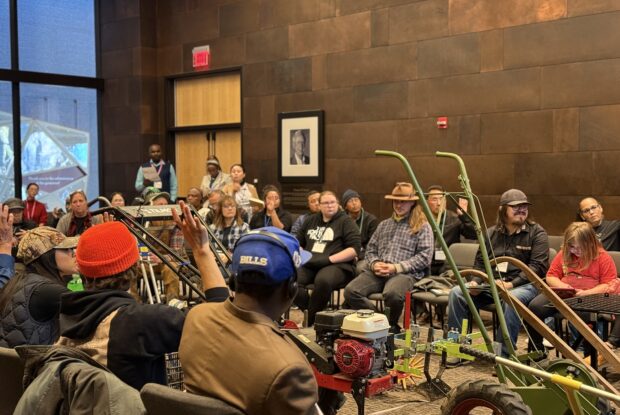 Emerging Farmers Conference workshop class with farmer tools.