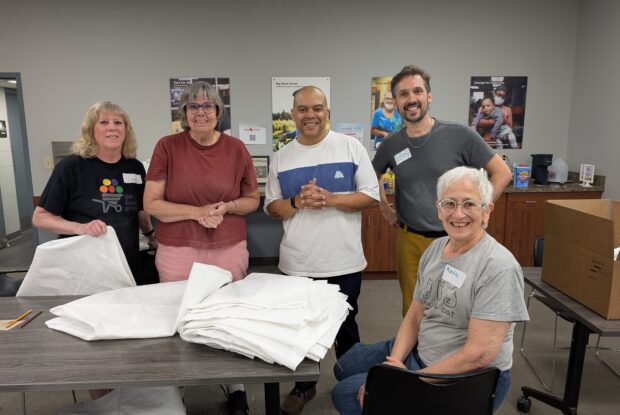 Volunteers upcycle food bags