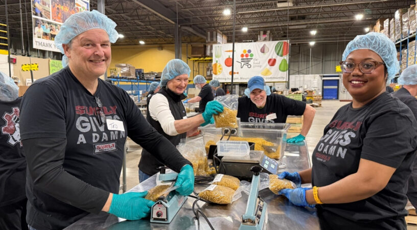 Surly volunteers at The Food Group.
